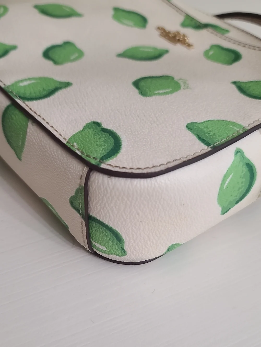 Coach White Crossbody with Green Lemon Motif and Tan Strap